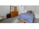 Comfortable bedroom with neutral decor, soft carpet, and lots of natural light at 1280 Gin House Ln, Lawrenceville, GA 30045