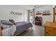 Bright bedroom features a large bed, soft carpet, and neutral décor at 1280 Gin House Ln, Lawrenceville, GA 30045