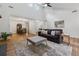 Bright living room with vaulted ceilings, neutral paint, and modern furnishings at 1280 Gin House Ln, Lawrenceville, GA 30045