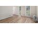 Versatile room featuring wood floors, and ample natural light at 1627 Isham Dr, Lawrenceville, GA 30046