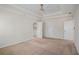 Spacious main bedroom featuring a trey ceiling, ceiling fan, and 3 closets at 1627 Isham Dr, Lawrenceville, GA 30046