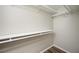 Walk-in closet with shelf and hanging space and wood-look flooring at 65 Sage St, Temple, GA 30179