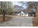View of the front of the house and front yard at 65 Sage St, Temple, GA 30179