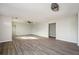 Spacious living room with new vinyl floors and fresh paint perfect for entertaining at 65 Sage St, Temple, GA 30179