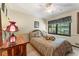 Relaxing bedroom with a decorative lamp and cozy bedding at 2062 Cezar Nw Dr, Kennesaw, GA 30152