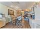 Dining room featuring hardwood floors, built-in shelves, and casual lighting at 2062 Cezar Nw Dr, Kennesaw, GA 30152