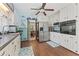Traditional kitchen with white cabinets, stainless steel appliances and hardwood floors at 2062 Cezar Nw Dr, Kennesaw, GA 30152