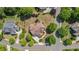 Expansive property featuring a large home with a spacious yard and mature trees in a suburban neighborhood at 2400 Gants Hill Pl, Cumming, GA 30041