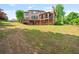 Expansive backyard with a two-level deck and patio, perfect for outdoor entertaining at 2400 Gants Hill Pl, Cumming, GA 30041