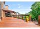 Wide angle view of the wooden deck overlooking a well landscaped yard at 2400 Gants Hill Pl, Cumming, GA 30041
