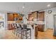Charming kitchen featuring custom cabinets, stainless steel appliances, and an island with bar seating at 2400 Gants Hill Pl, Cumming, GA 30041