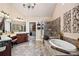 This bathroom features double vanities, a spa tub, and a separate glass-enclosed shower at 2400 Gants Hill Pl, Cumming, GA 30041