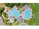 Aerial view of a multi-pool community center with many options for recreation and relaxation at 2400 Gants Hill Pl, Cumming, GA 30041