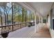 Enjoy the scenic lake views from the back porch with a swing, creating a relaxing retreat at 4211 Burnt Hickory Nw Rd, Marietta, GA 30064