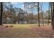 Enjoy the tranquility of this property with a private lake, creating a serene backdrop at 4211 Burnt Hickory Nw Rd, Marietta, GA 30064