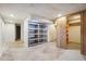 Unfinished basement featuring a metal shelf and concrete floor at 4211 Burnt Hickory Nw Rd, Marietta, GA 30064