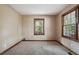 Comfortable bedroom with natural light, neutral carpeting, and a serene atmosphere, perfect for restful nights at 4211 Burnt Hickory Nw Rd, Marietta, GA 30064