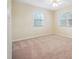 Neutral bedroom with carpet, ceiling fan, natural light from windows and off-white walls at 4211 Burnt Hickory Nw Rd, Marietta, GA 30064