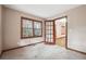 Cozy bedroom featuring natural light and neutral carpeting, creating a peaceful retreat for relaxation and rest at 4211 Burnt Hickory Nw Rd, Marietta, GA 30064