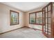 Bedroom with two windows and neutral carpeting, a great space for relaxation and rest at 4211 Burnt Hickory Nw Rd, Marietta, GA 30064