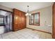 Inviting dining area showcasing tile floors, abundant cabinet space, and a large window for enjoying meals with a view at 4211 Burnt Hickory Nw Rd, Marietta, GA 30064