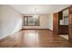 Charming dining room with a chandelier, large window, and hardwood floors, ideal for enjoying meals and gatherings at 4211 Burnt Hickory Nw Rd, Marietta, GA 30064