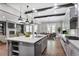 Stylish kitchen with a large center island, stainless steel appliances, and open access to the living area at 4884 Kentwood Dr, Marietta, GA 30068