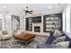 Inviting living room features a fireplace, built-in bookshelves, and comfortable seating at 4884 Kentwood Dr, Marietta, GA 30068