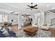Open-concept living space featuring a modern kitchen, dining area, and comfortable seating at 4884 Kentwood Dr, Marietta, GA 30068