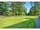 Expansive green space, perfect for outdoor activities or relaxing in a serene environment at 228 Smokerise Se Cir, Marietta, GA 30067