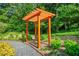 Charming pergola with bench seating, surrounded by greenery, creating a peaceful retreat at 228 Smokerise Se Cir, Marietta, GA 30067