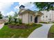Brick building featuring manicured lawn with sidewalk at 3481 Landen Pine Ne Ct, Atlanta, GA 30305