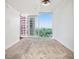 Neutral bedroom with carpet floor and floor-to-ceiling windows with a city view at 361 17Th Nw St # 2407, Atlanta, GA 30363