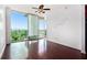 Bright living room features hardwood floors and floor-to-ceiling windows with a city view at 361 17Th Nw St # 2407, Atlanta, GA 30363