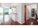 Open floor plan connects the living room, kitchen, and hallway with hardwood floors at 361 17Th Nw St # 2407, Atlanta, GA 30363