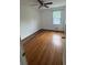 Bedroom featuring hardwood floors, neutral walls, and a window for natural light at 2190 Olive Springs Se Rd, Marietta, GA 30060