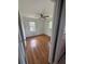 Bright bedroom with hardwood floors, ceiling fan, and windows letting in plenty of natural light at 2190 Olive Springs Se Rd, Marietta, GA 30060