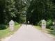 Paved bike trail surrounded by lush green trees and vegetation, perfect for outdoor recreation at 2190 Olive Springs Se Rd, Marietta, GA 30060