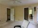 Bright bedroom area with 2 entry doors and large closet, offering ample space and natural light at 2413 Charleston Oaks Ln, Decatur, GA 30030