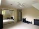 This bedroom features a ceiling fan, providing a comfortable haven for rest and relaxation at 2413 Charleston Oaks Ln, Decatur, GA 30030