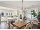Spacious kitchen blends seamlessly into the dining area with a large island and modern stainless appliances at 3332 Old Concord Se Rd, Smyrna, GA 30082