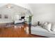 Spacious main bedroom with hardwood floors, sitting area, and vaulted ceilings at 4699 Price St, Forest Park, GA 30297