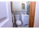 Cozy bathroom with classic white fixtures and neutral color scheme at 87 Valley Rd, Lawrenceville, GA 30044