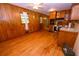 Functional kitchen with wood-paneled walls and stainless steel appliances at 87 Valley Rd, Lawrenceville, GA 30044