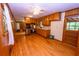 Charming kitchen area with stainless appliances and wood cabinets at 87 Valley Rd, Lawrenceville, GA 30044