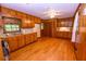 Traditional kitchen with ample wood cabinetry, wood-paneling and natural light at 87 Valley Rd, Lawrenceville, GA 30044