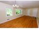 Inviting living room with hardwood floors and abundant natural light at 87 Valley Rd, Lawrenceville, GA 30044