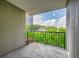 An outdoor patio that overlooks trees and a building at 275 13Th Ne St # 409, Atlanta, GA 30309