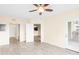 A spacious living room with hard wood floors and a doorway to a outdoor balcony at 275 13Th Ne St # 409, Atlanta, GA 30309