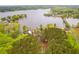 Breathtaking aerial shot of a lakeside community surrounded by lush greenery, showcasing waterfront homes and tranquil waters at 48 Paschal St, Temple, GA 30179